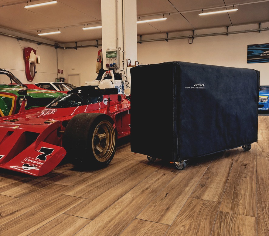 Superleggera with black cover in garage motorsport